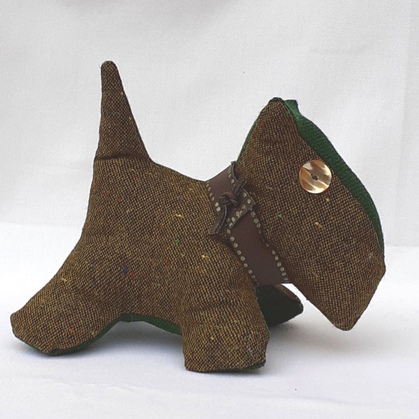 Close up of brown tweed scottie dog with green tweed accent head and stomach panels.