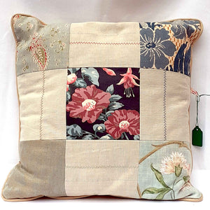Handmade patchwork cushion from mixed upcycled fabric