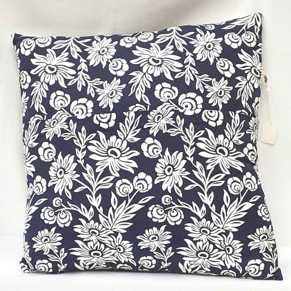 Handmade cushion with patchwork design and bold dark blue and white reverse