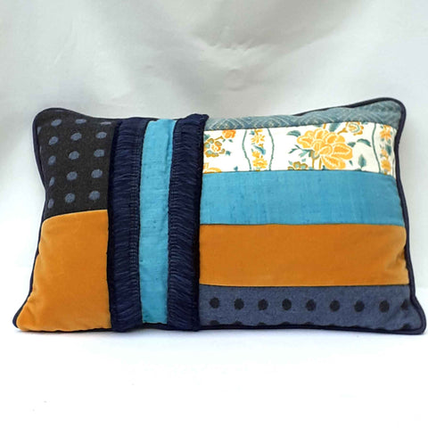 Handmade rectangular piped cushion with patchwork mixed upcycled fabrics