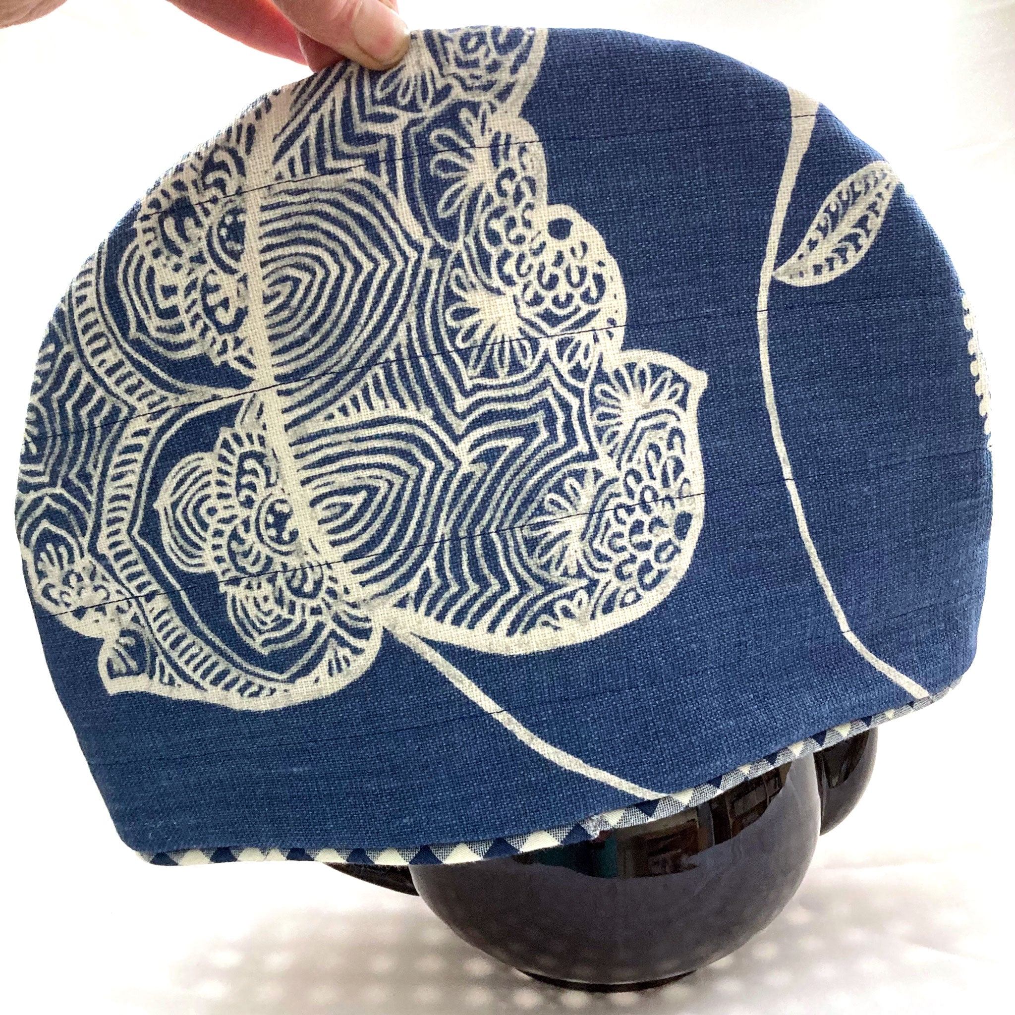 Blue tea cosy made with upcycled fabric