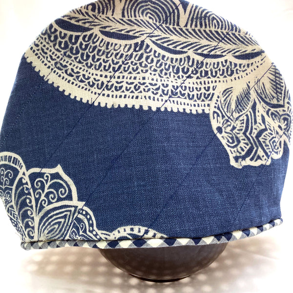 Blue tea cosy made with upcycled fabric