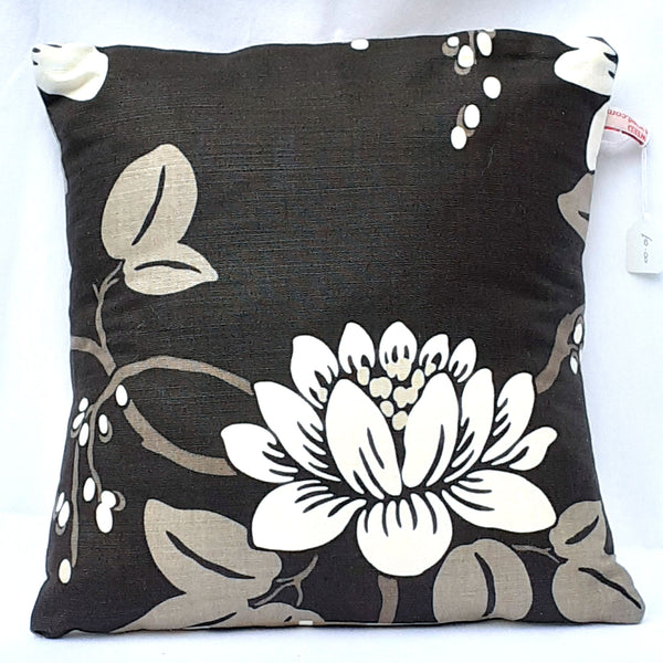 Handmade envelope cushion with bold brown floral design