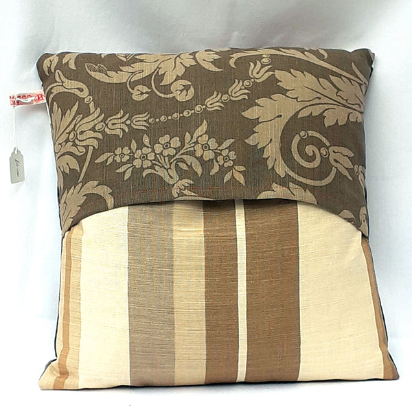 Handmade envelope cushion with bold brown floral design