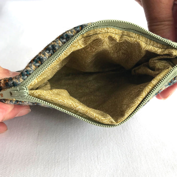 Inside the Tweed purse with beige and brown patterned fabric