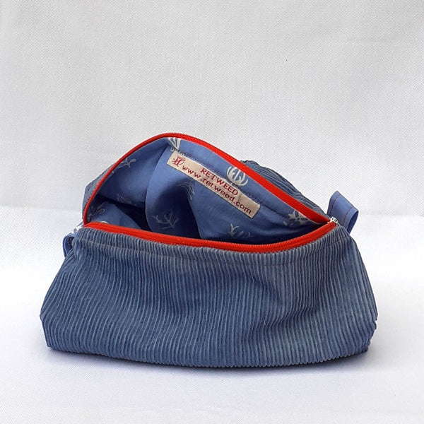 Handmade cosmetic bag in blue corduroy