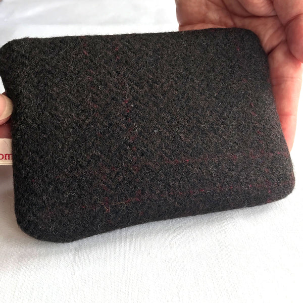 Reverse of dark brown tweed purse