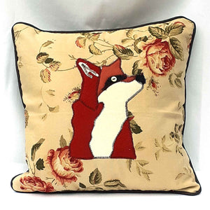 Piped floral cushion with a red fox design