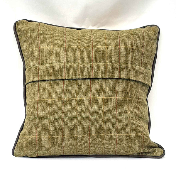 Reverse of cushion with tweed fabric and dark grey piping