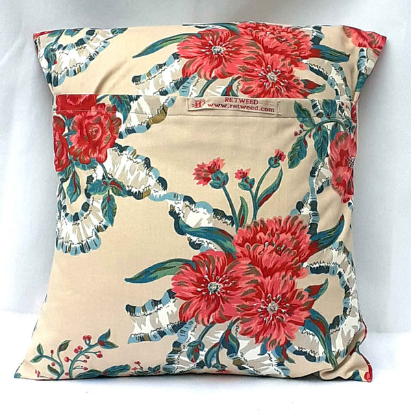 Handmade envelope cushion with floral design