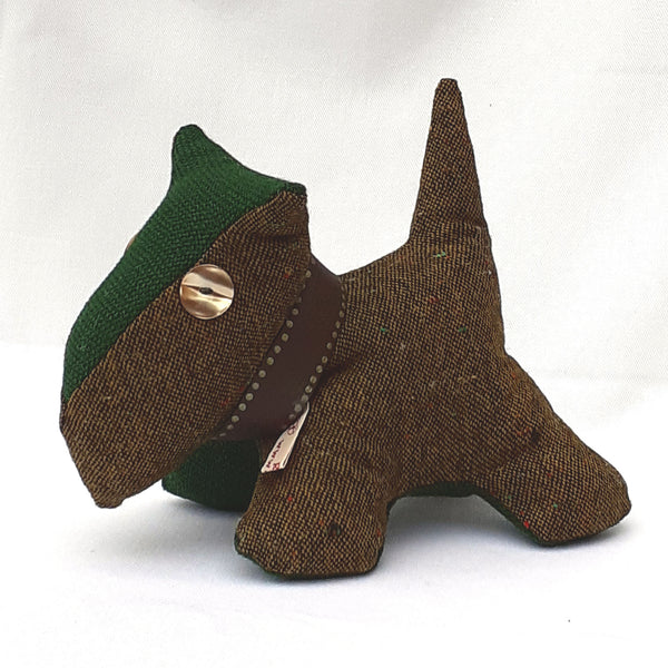 Close up of brown tweed scottie dog with green tweed accent head and stomach panels.