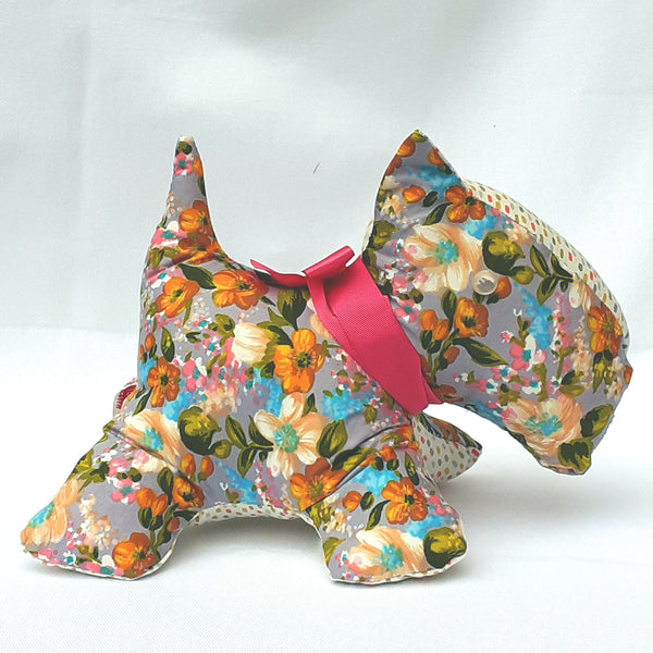 Handmade scottie dog with floral pattern fabric and a pink bow