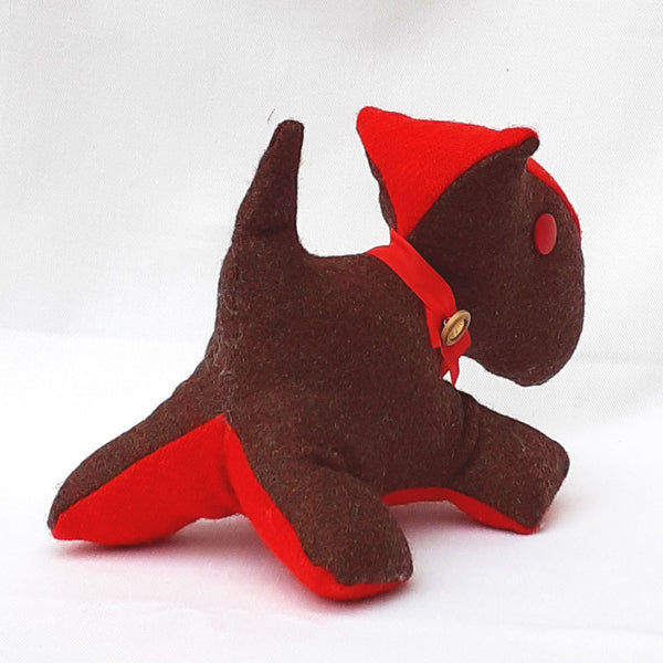 Rear view of handmade scottie dog with brown tweed fabric, red stomach, nose, collar and button eye