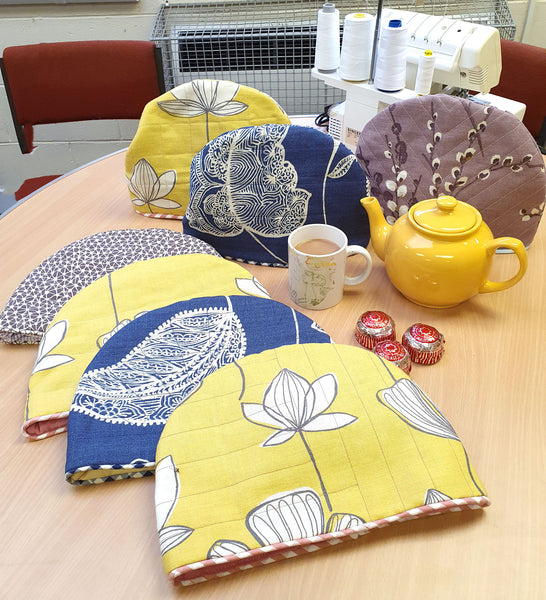 Yellow tea cosy made with upcycled fabric