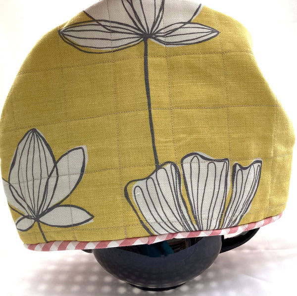 Yellow tea cosy made with upcycled fabric